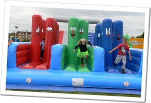 kids on an its a knockout inflatable