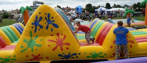 climbing an inflatable for it's a knockout