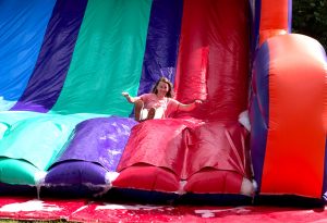 Sliding down the inflatable slide